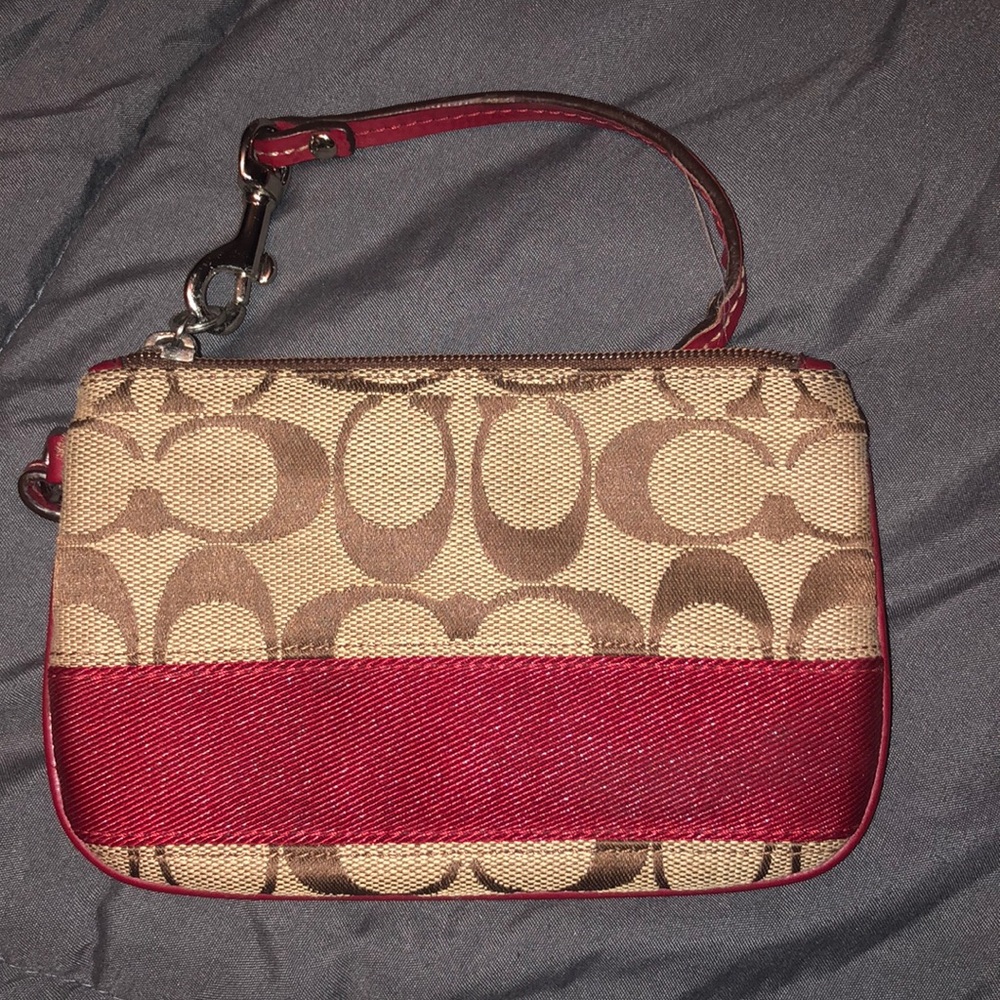Coach mini wristlet in brown and tan